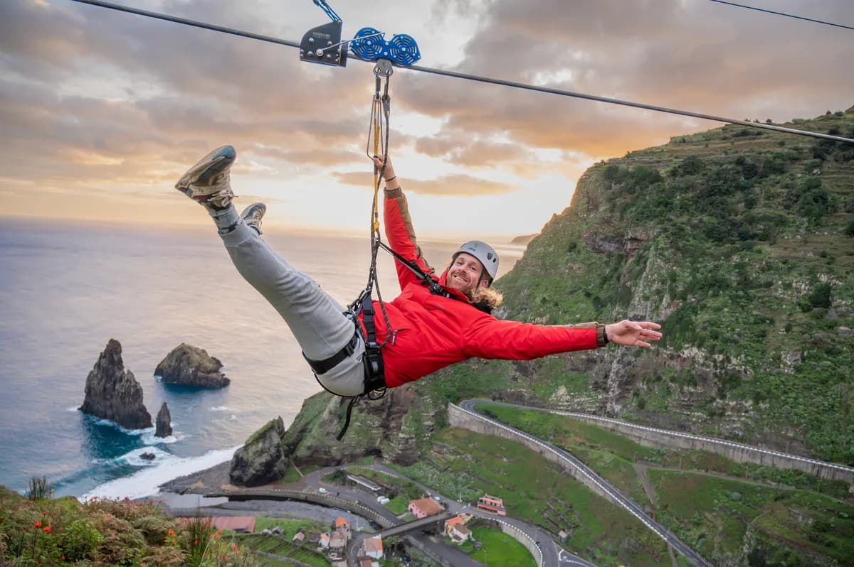 Zipline rider soaring at 110 km/h
